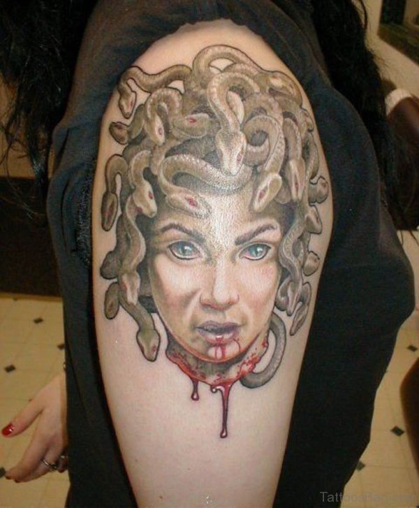 Injured Medusa Tattoo On Right Bicep