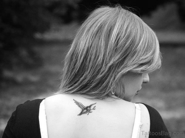 Bird Tattoo On Upper Back