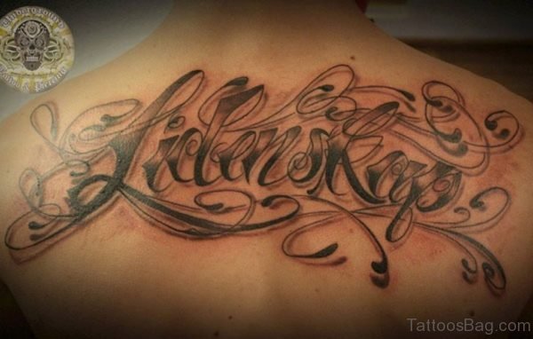 Lettering Back Tattoo