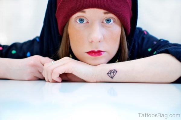 Lovely Girl With Cute Diamond Tattoo On Wrist