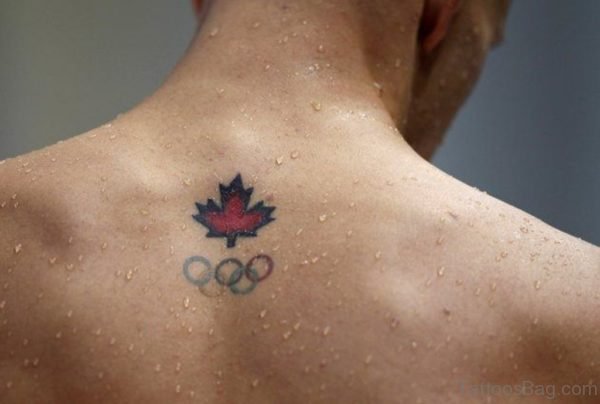 Maple Leaf Tattoo On Man Upper Back