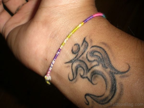 Ohm Tattoo Dual Outline On Wrist
