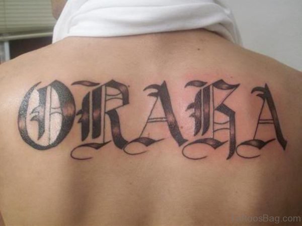 Amazing Old English Tattoo On Back