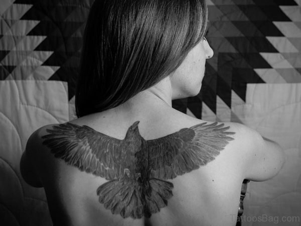 Open Wings Crow Tattoo On Upper Back
