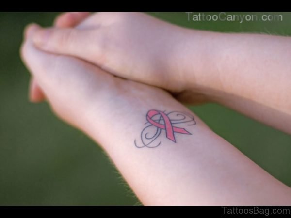 Pink Cancer Ribbon Wrist Tattoo