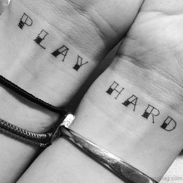 Play Hard Tattoo On Wrist