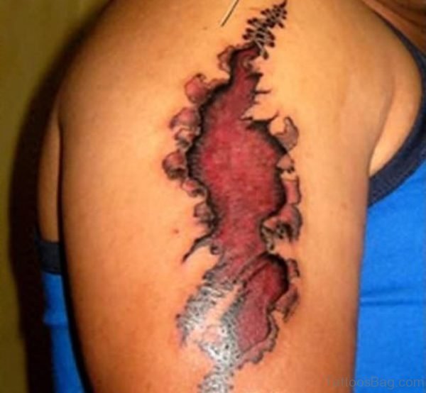 Red Skin Rip Tattoo