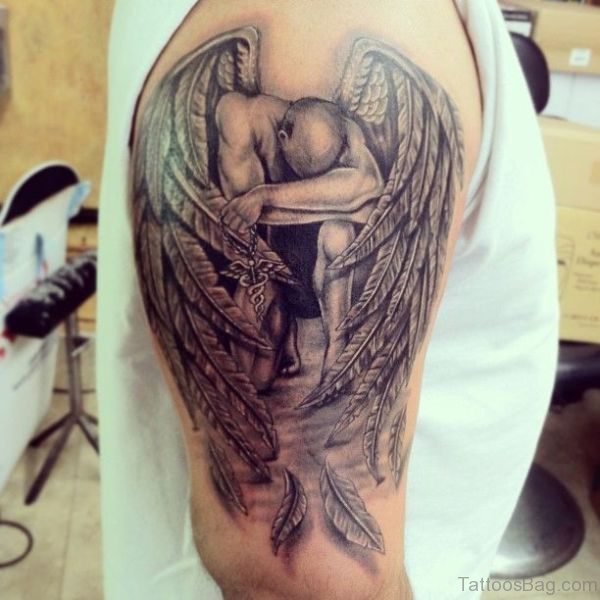 Sad Angel Shoulder Tattoo Design