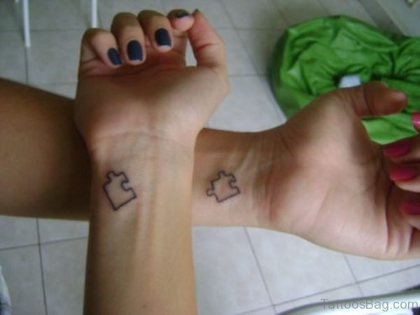 Sister Have Matching Puzzle Tattoo
