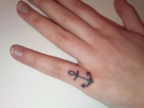 Small Anchor Tattoo On Finger