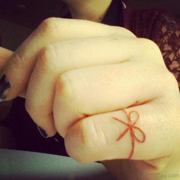 Small Bow Tattoo