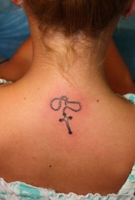 Small Chain And Cross Tattoo
