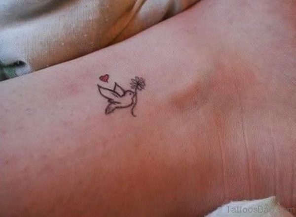 Small Dove Tattoo On Wrist