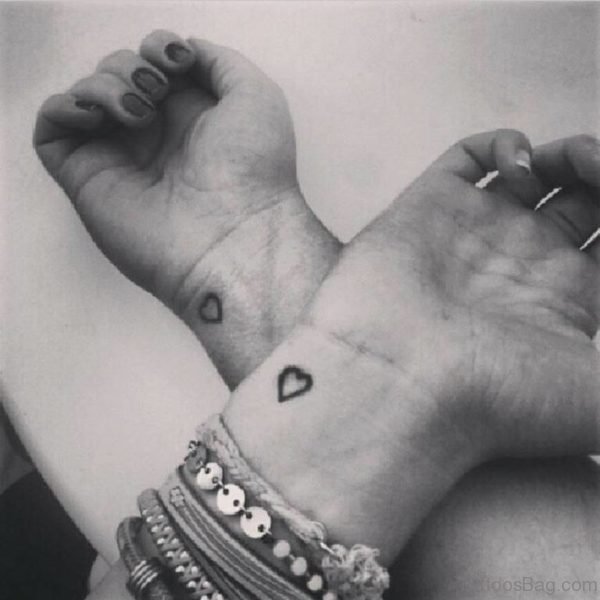 Small Hearts Tattoo On Wrist