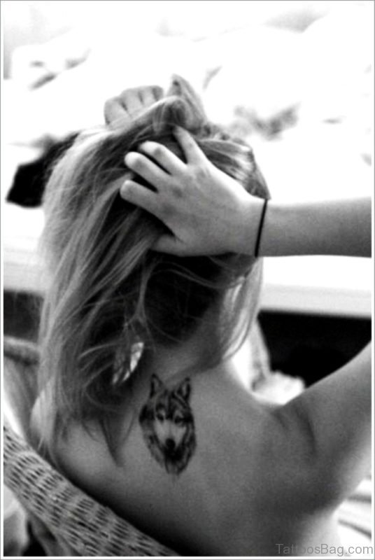 Small Wolf Tattoo
