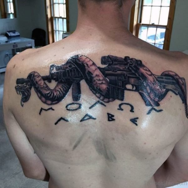Snake Wrapped Around Rifle Tattoo