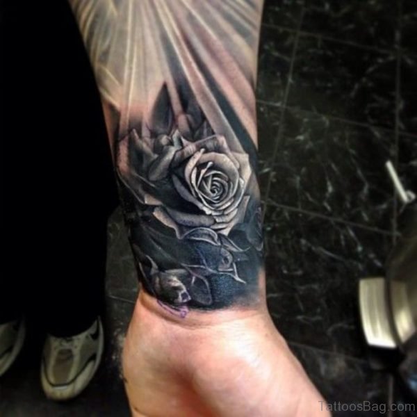 Stunning Black Rose Tattoo On Wrist