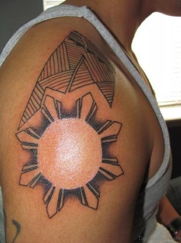 Sun Tattoo On Right Shoulder