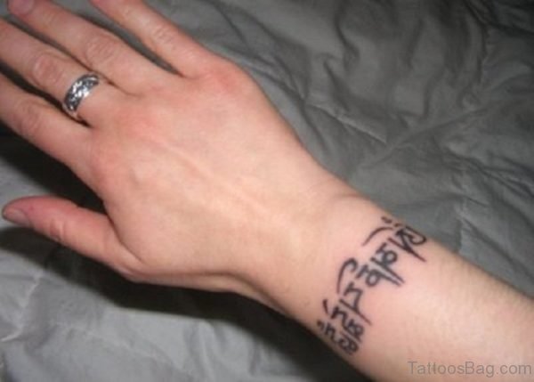Tibetan Wrist letter Tattoo