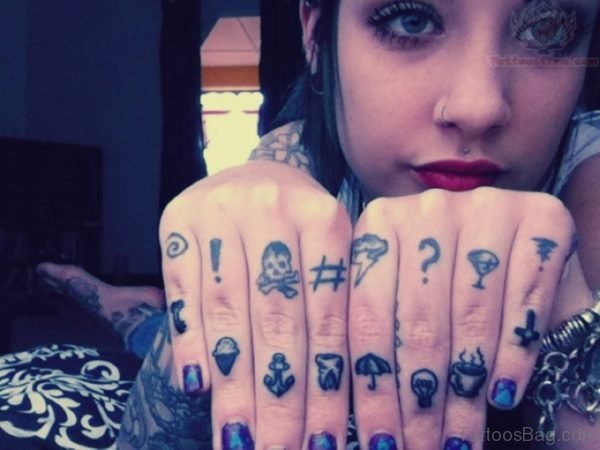 Tiny Finger Tattoo