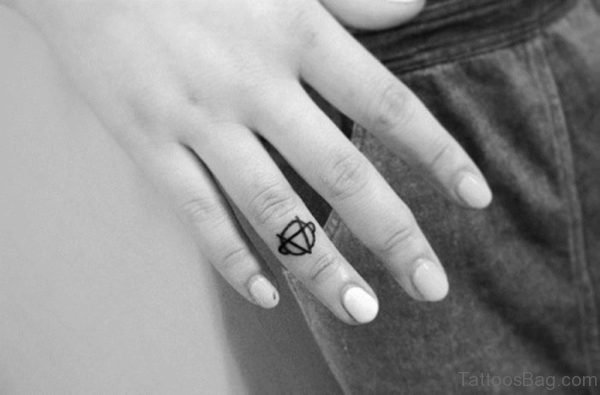 Tiny Finger Tattoo