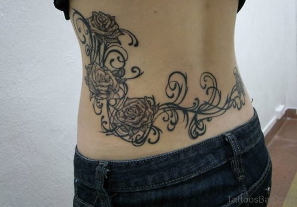 Tribal Rose Tattoo On Lower Back