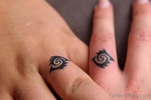 Tribal Wedding Ring Tattoo On Finger
