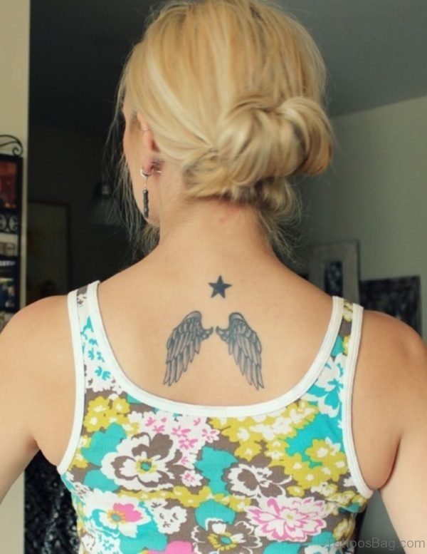 Wings And Star Tattoo On Back