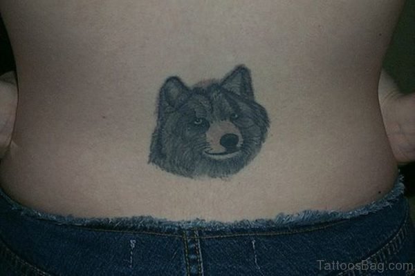 Wolf Face Tattoo On Lower Back