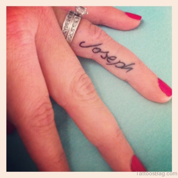 Word Tattoo Design On Finger