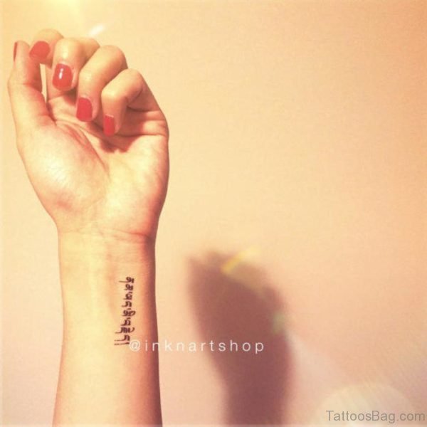 Word Tattoo On Wrist