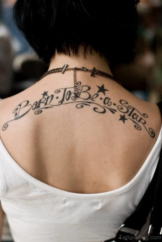 Wording And Stars Tattoo On Back