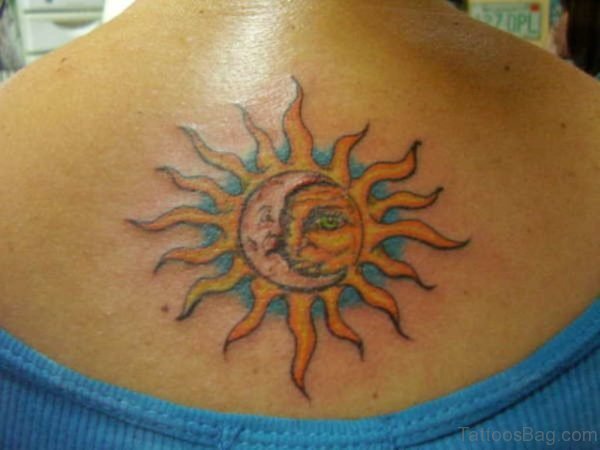 Attractive Sun And Moon Tattoo On Back