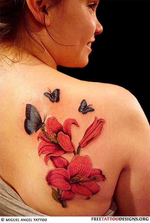 kanji And Cherry Blossom Tattoo On Woman Back