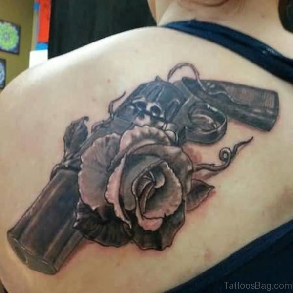 Gun And Rose Tattoo On Back
