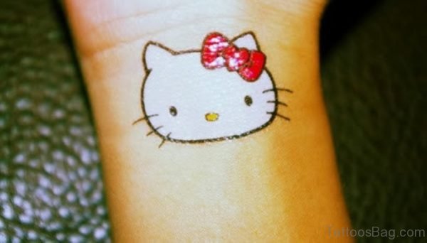 White Red kitty Wrist Tattoo