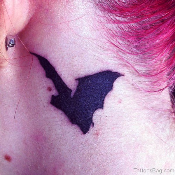Adorable Black Bat Tattoo On Neck