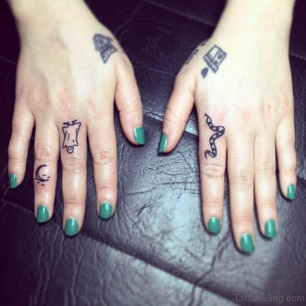 Adorable Moon Tattoo On Finger