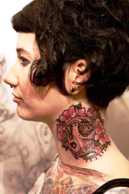 Adorable Neck Skull Tattoo Design