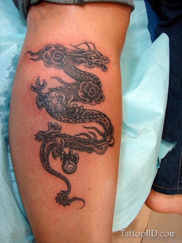 Again Dragon Tattoo On Leg