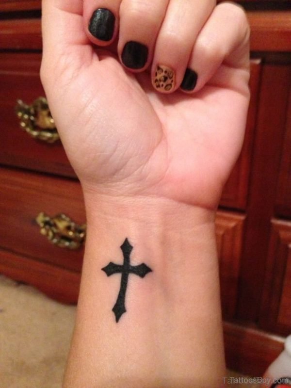 Amazing Black Cross Tattoo On Wrist