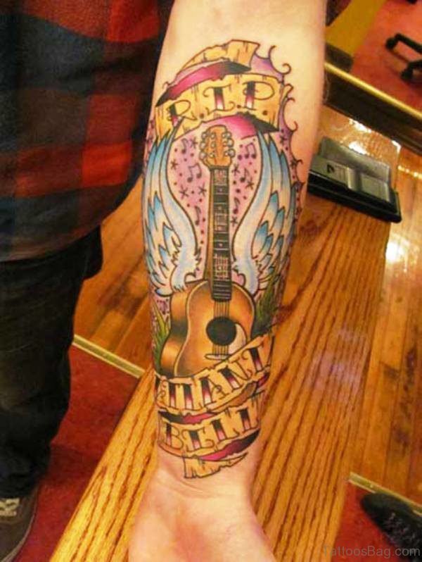Amazing Guitar Tattoo With Wings On Forearm
