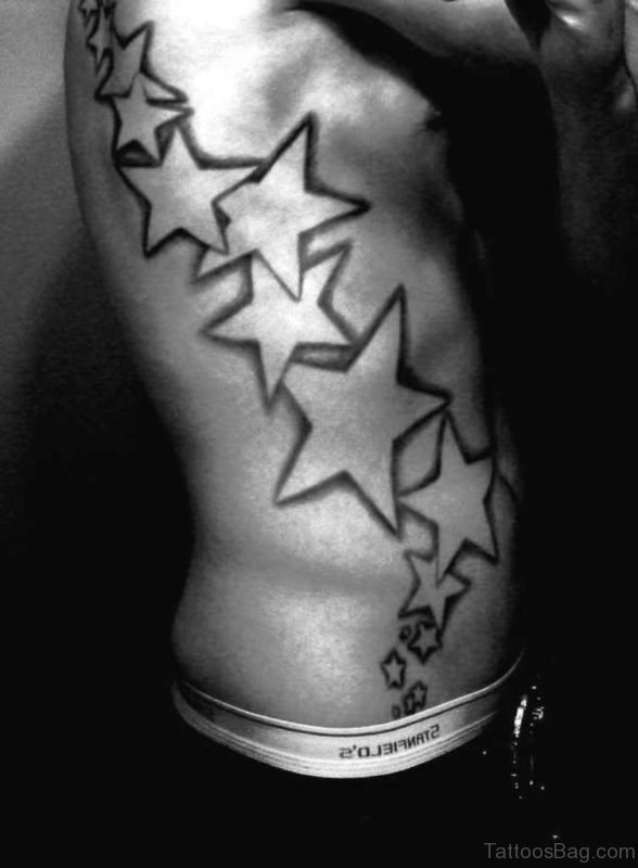 Amazing Star Tattoo On Rib