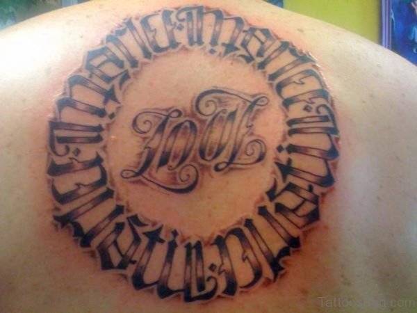 Ambigram Circle Tattoo On Upper Back