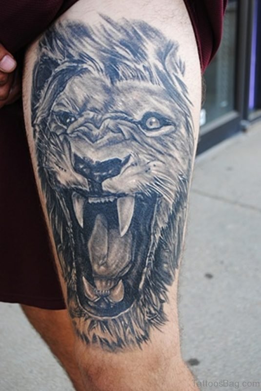 Angry Lion Tattoo On Thigh