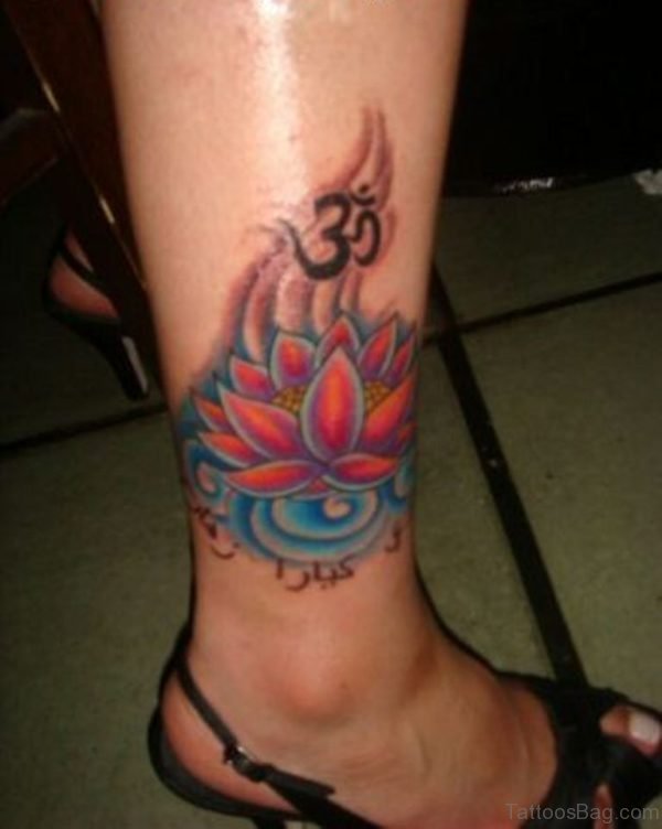 Asian Lotus Flower With Ohm Symbol Tattoos On Ankle
