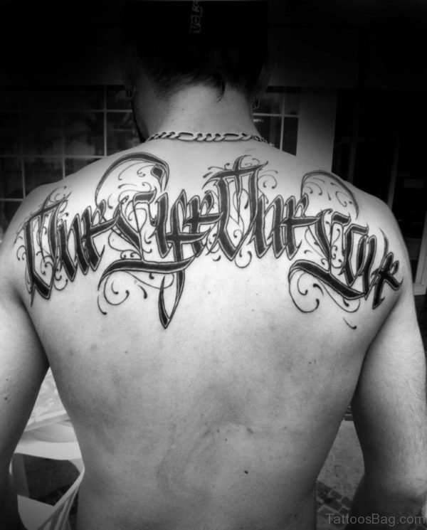 Attractive Ambigram Tattoo On Upper Back
