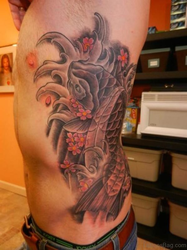 Attractive Fish Tattoo On Rib