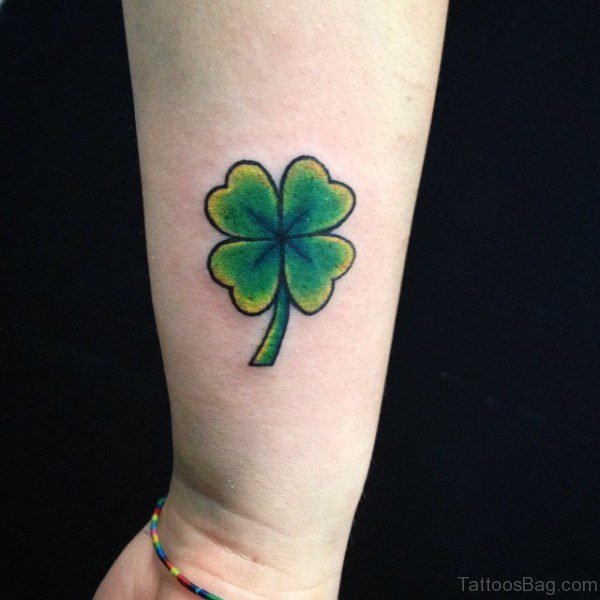 Attractive Four Leaf Tattoo On Wrist