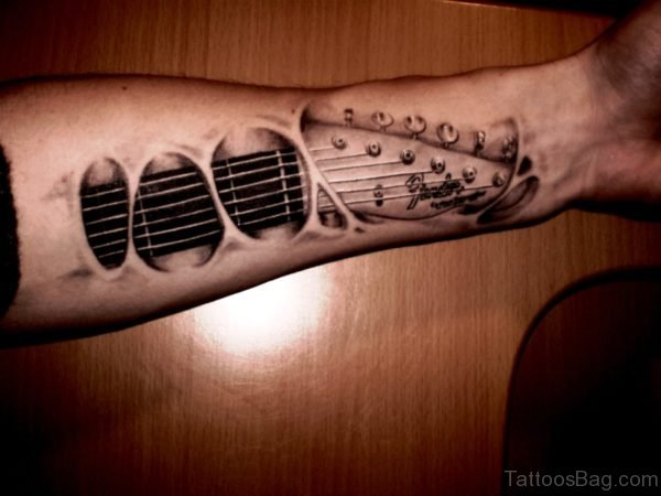 Attractive Guitar Tattoo On Forearm